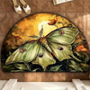 A painting of a green dragonfly with orange and yellow floral elements set against a warm, golden background.