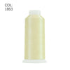 A roll of light yellow machine embroidery thread with a white cap.