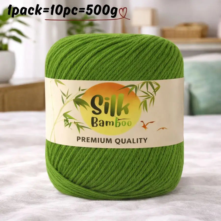 A ball of bright green silk bamboo blend yarn labeled Premium Quality for knitting and crochet.