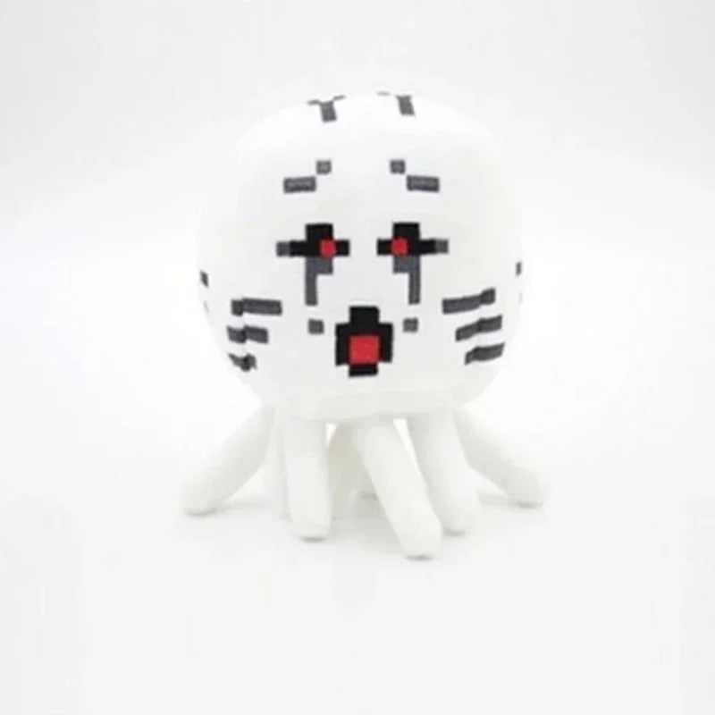 A white stuffed dragon plush toy with black markings and small white legs.