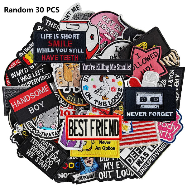 A collection of random embroidered patches featuring various text and designs.