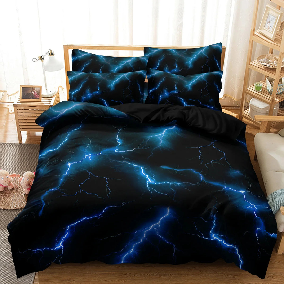 A dark blue and black duvet cover set featuring a lightning bolt print on a bed.