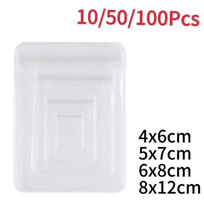 Clear plastic jewelry storage bags in various sizes 4x6cm, 5x7cm, 6x8cm, and 8x12cm