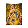 A football player in a yellow jersey and blue shorts is shown alongside a larger player in a vintage knit throw blanket.