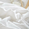 White soft washed duvet cover set with pom-pom decoration fabric folds