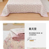 Pink floral quilted bedspread with pink piping and a matching pillow set.