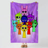 A purple flannel blanket featuring colorful cartoon characters with large eyes and various skin tones.
