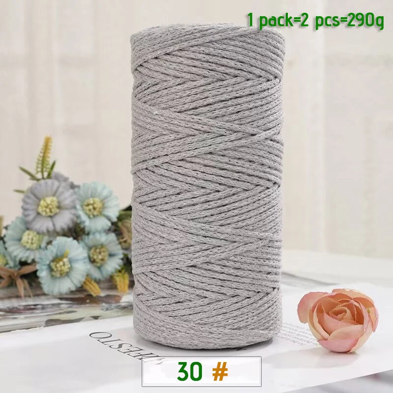 A roll of medium-thick gray hand-woven cotton yarn for crafting, packaged as one pack of two pieces.