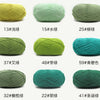 A collection of various colored and textured knitting yarns shown in skeins.