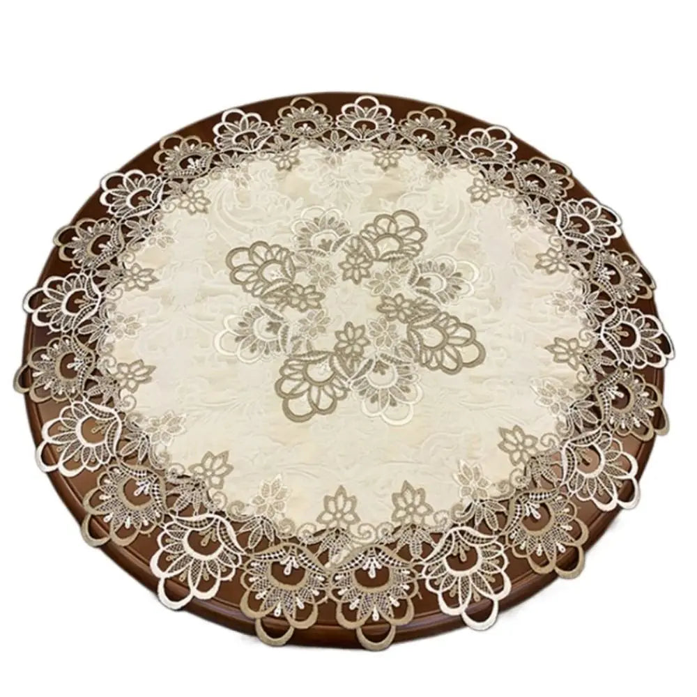 Elegant lace-trimmed round tablecloth with a beige center and brown border.