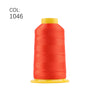 A spool of bright orange embroidery thread with a yellow core.