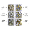 A clear plastic container filled with various sizes of gold and silver glass rhinestones for crafting.