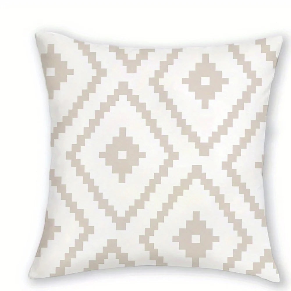 A decorative pillow cover featuring a white background with a geometric diamond pattern in beige and gray.