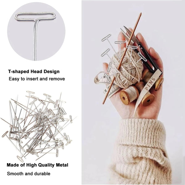 A hand holds a bundle of T-shaped metal pins used for crafting and sewing.