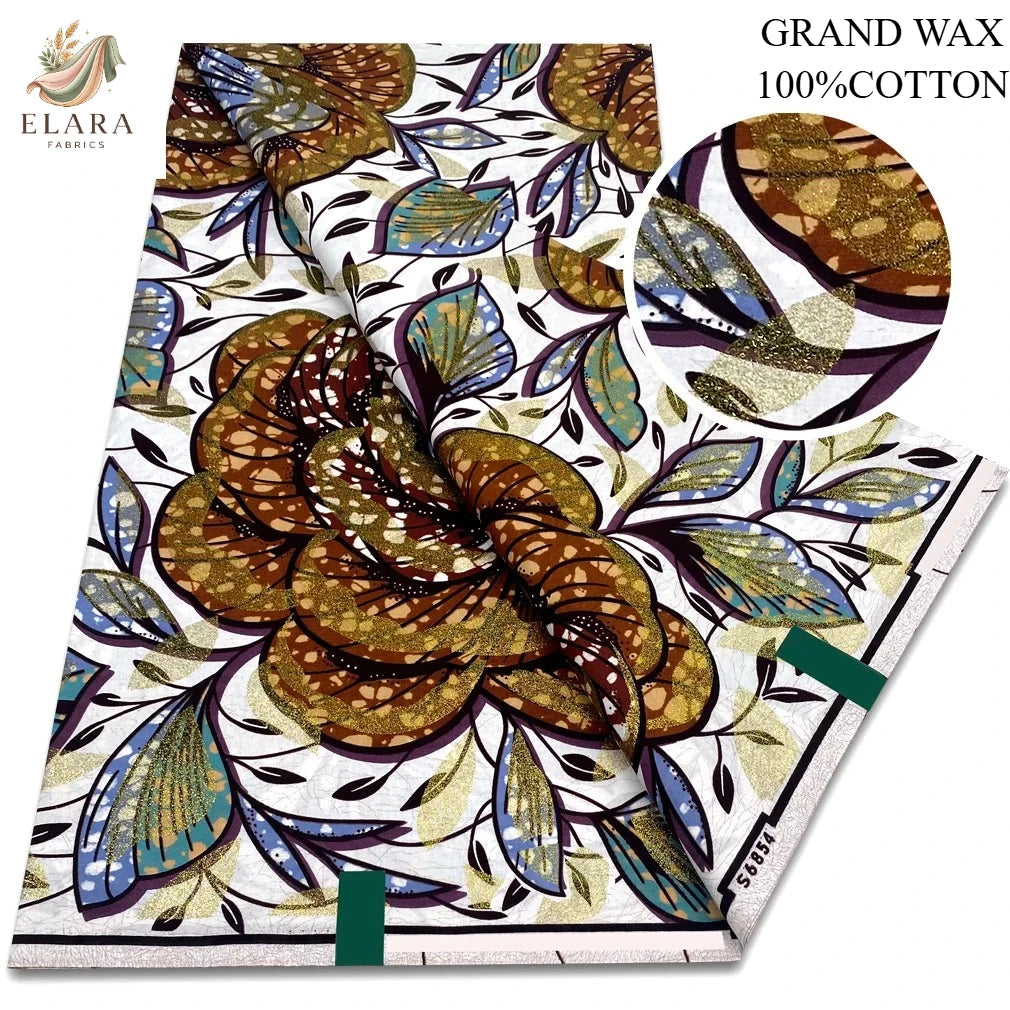 A bolt of brown and blue African wax print fabric with floral patterns.