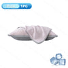 Pink ice silk cooling pillowcase shown flat with a piece of ice nearby