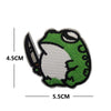 A green embroidered patch depicting a stylized frog head with white accents.