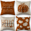 Four pumpkin-themed pillow covers in shades of burnt orange and beige.