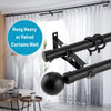 Black heavy duty double curtain rod brackets mounted on a window for hanging curtains