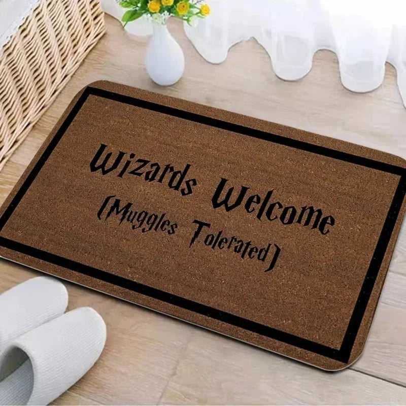 A brown entrance mat with the text Wizards Welcome Muggles Tolerated printed on it.