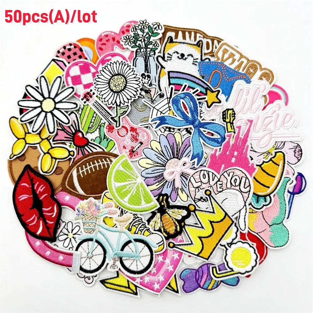 A collection of assorted cartoon embroidery patches featuring various animals, flowers, and abstract designs for DIY projects