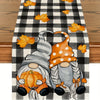 Autumn plaid table runner featuring a pumpkin dwarf character design on a black and white checkered background.