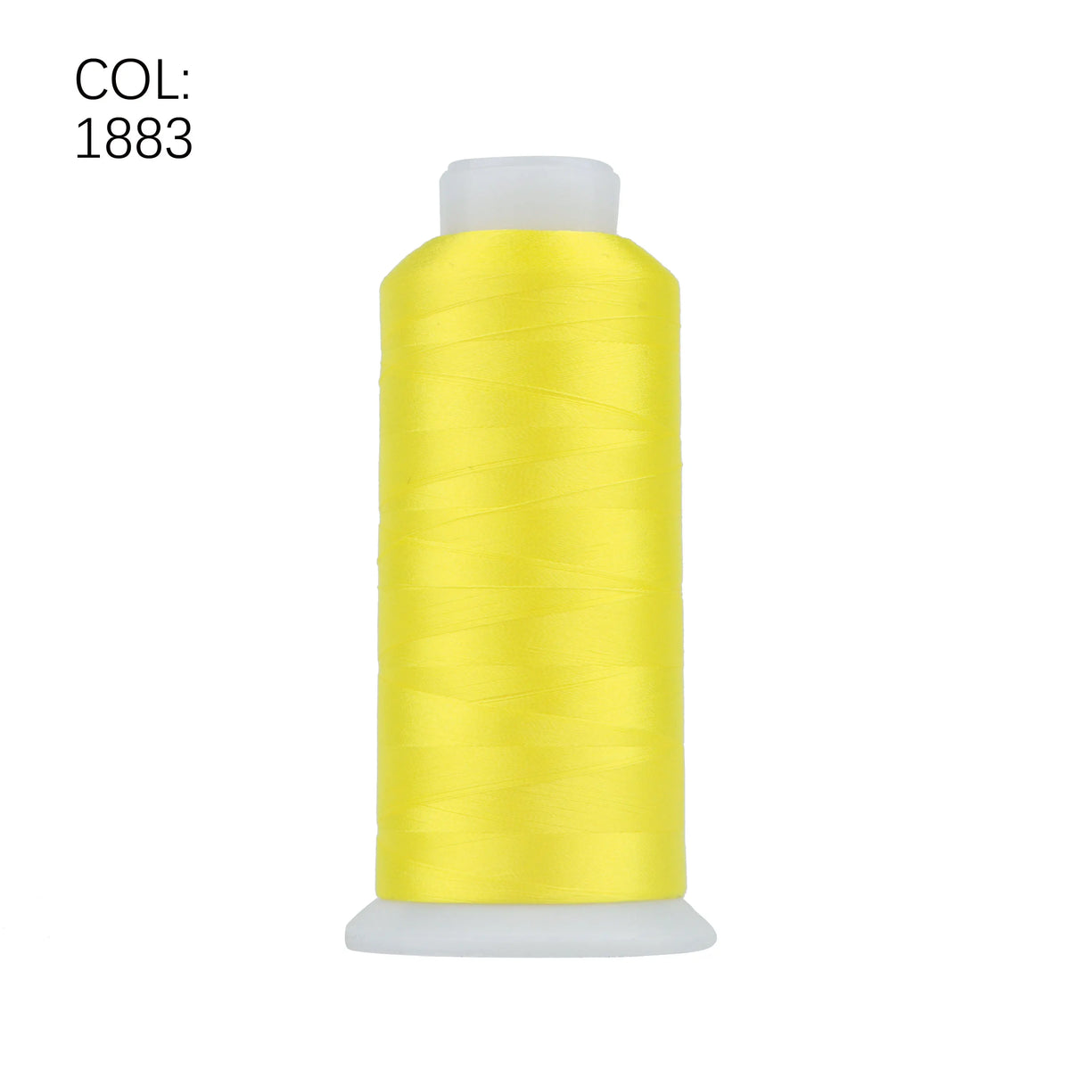 A spool of bright yellow high tenacity machine embroidery thread labeled COL: 1883.