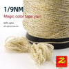Spool of 1/9NM magic color tape yarn made of 62% nylon with gold and silver wire, showing a loose strand.