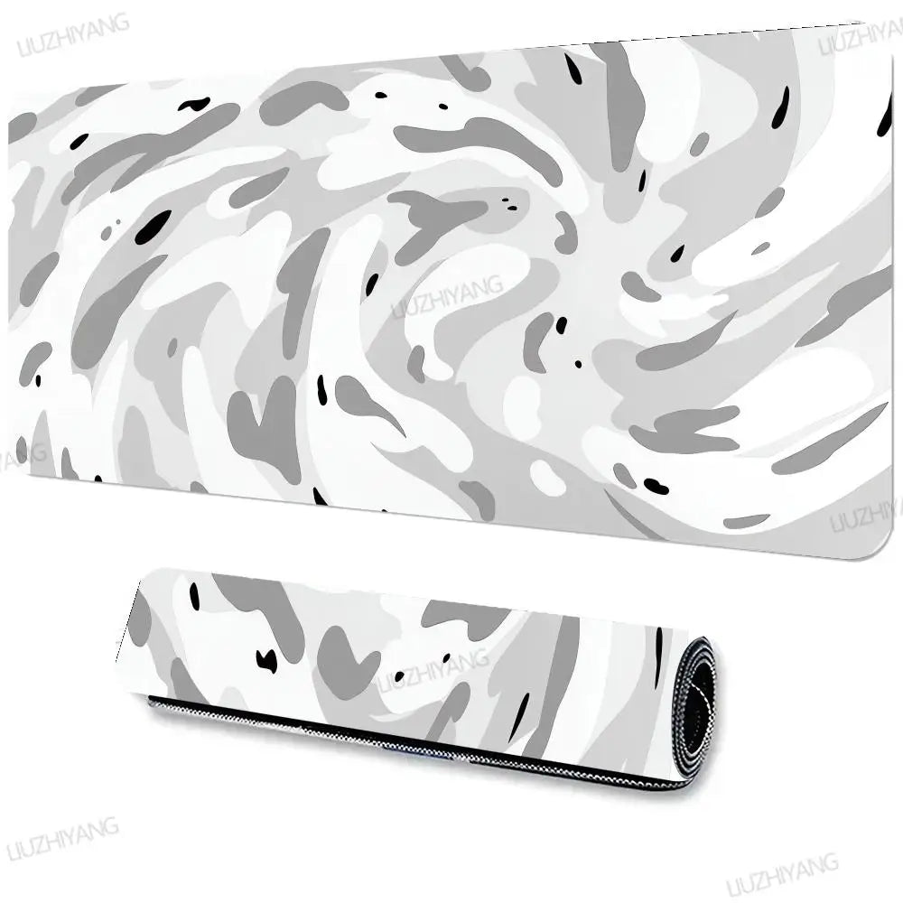 A rolled up large art vortex mouse pad featuring a gray and white marbled pattern.