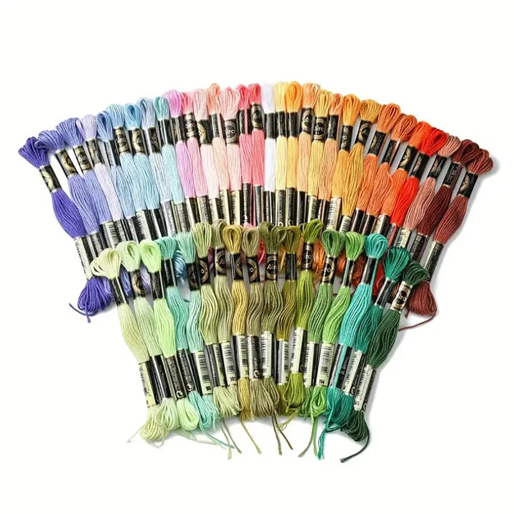A collection of 12 pack rainbow gradient embroidery floss threads in various colors and shades.
