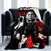 A black and red horror themed throw blanket featuring a graphic of Michael Myers.