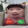 A decorative throw pillow cover featuring a photo of a smiling child wearing a dark cap.