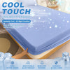 A close-up of a light blue cooling fitted sheet on a bed, highlighting features like cool to the touch and durable easy care.