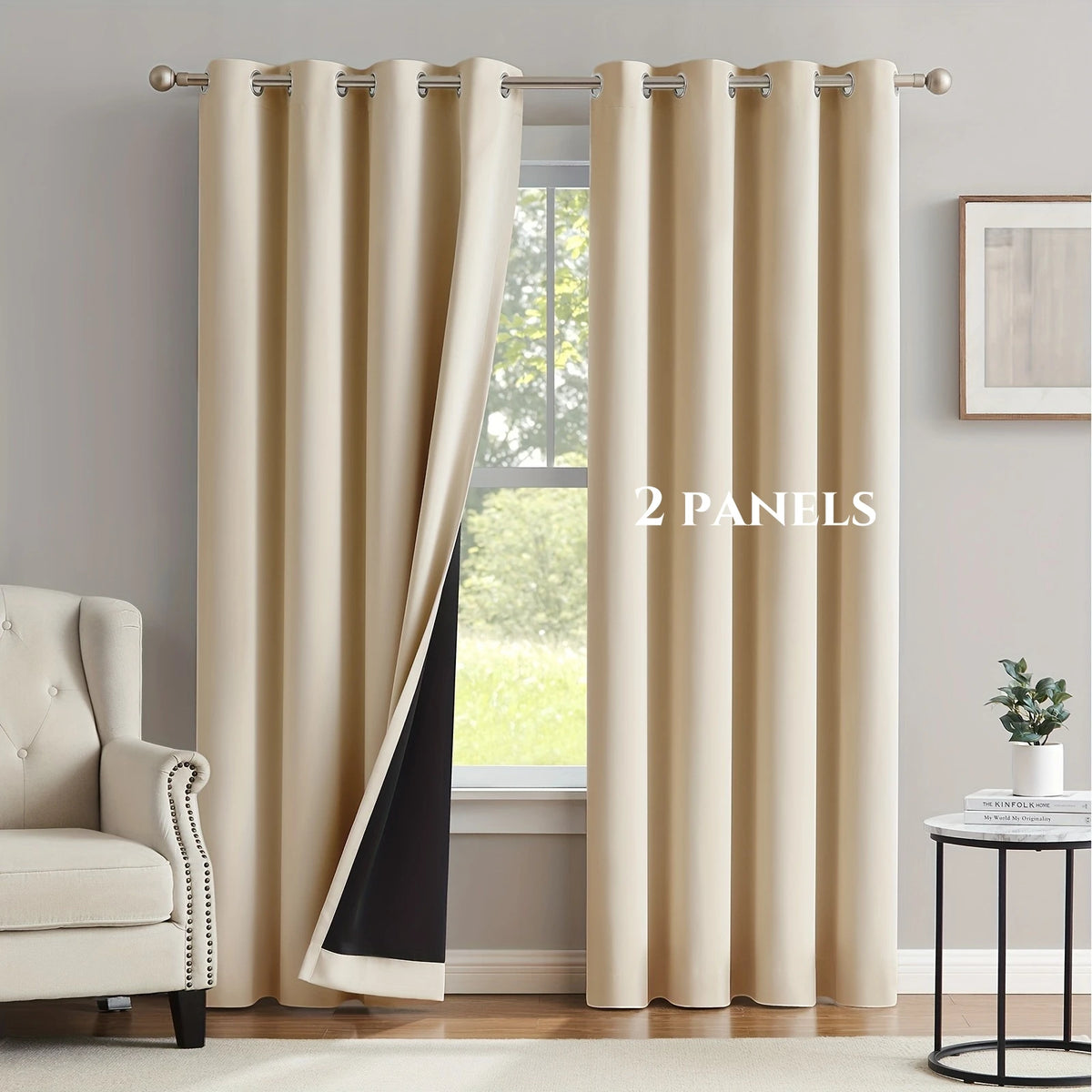 Two beige blackout grommet curtains hanging in a window frame.