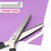 Stainless steel zig zag tailor sewing scissors with a 7mm measurement guide shown on purple paper