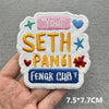 Embroidered patch featuring the text You Seth Pangsi Feng Cub in yellow and blue thread on white fabric