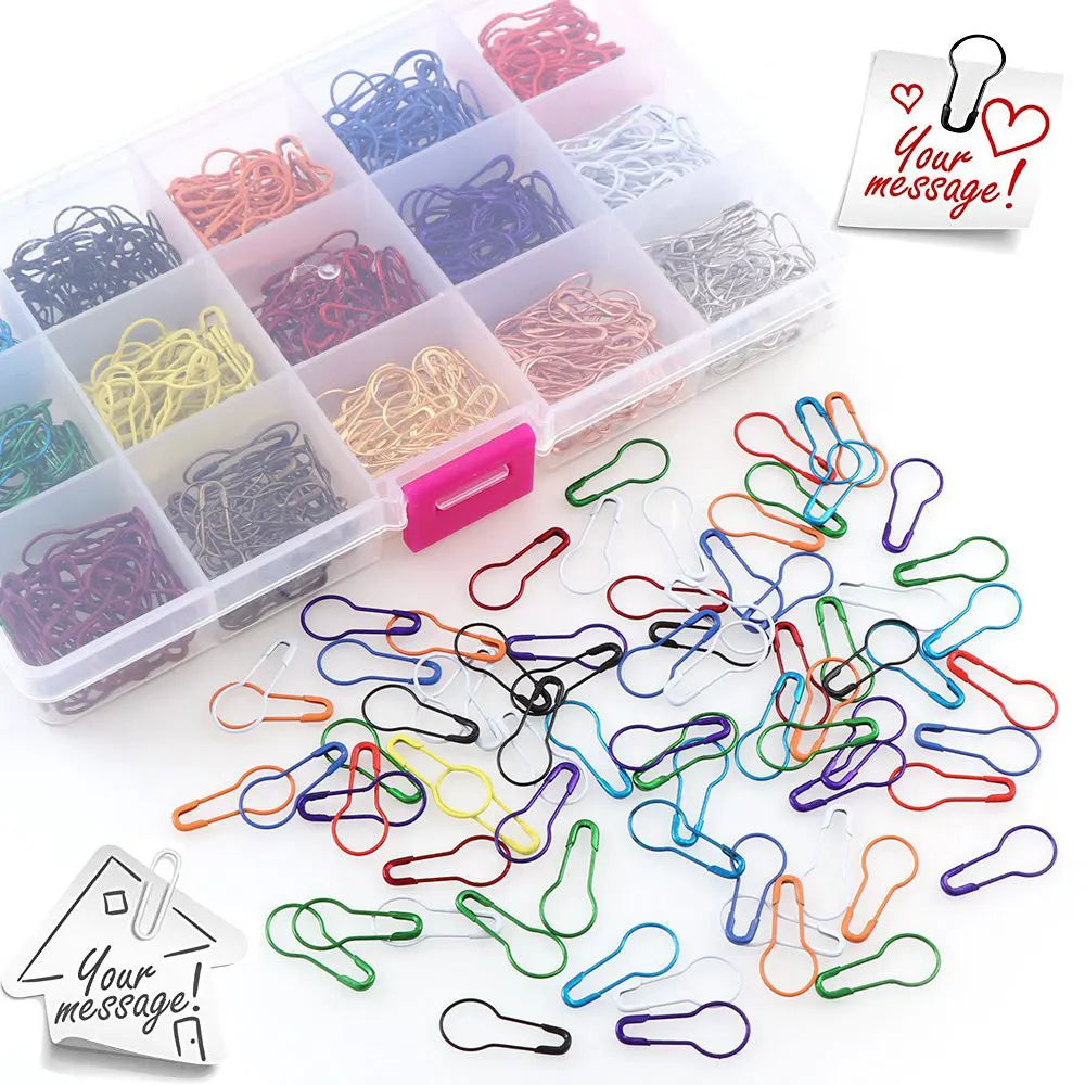 A collection of colorful safety bulb pins for knitting and sewing, including various colors like red, blue, yellow, and green