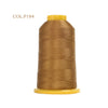 A spool of gold-brown polyester embroidery thread labeled COL.P184 on a yellow background.