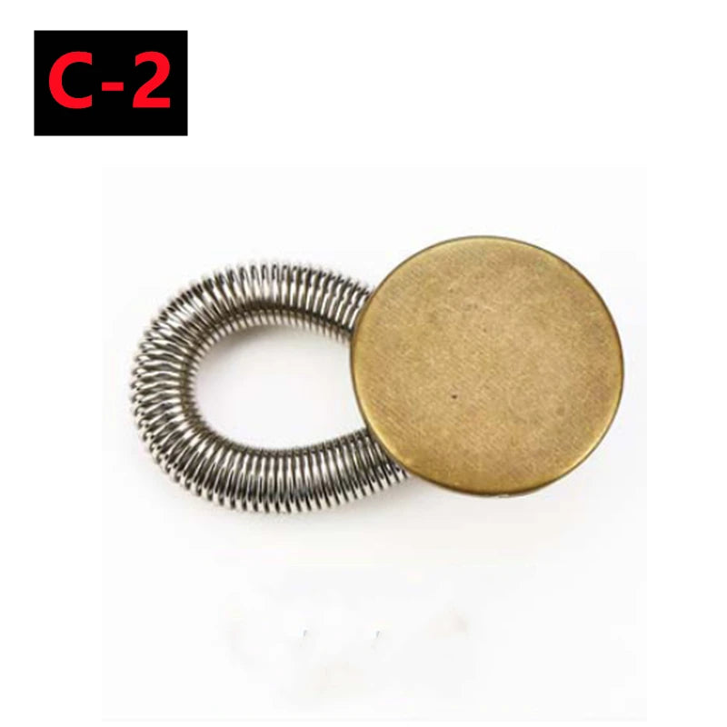 A round metal button extender with a serrated edge, used for pants and jeans.
