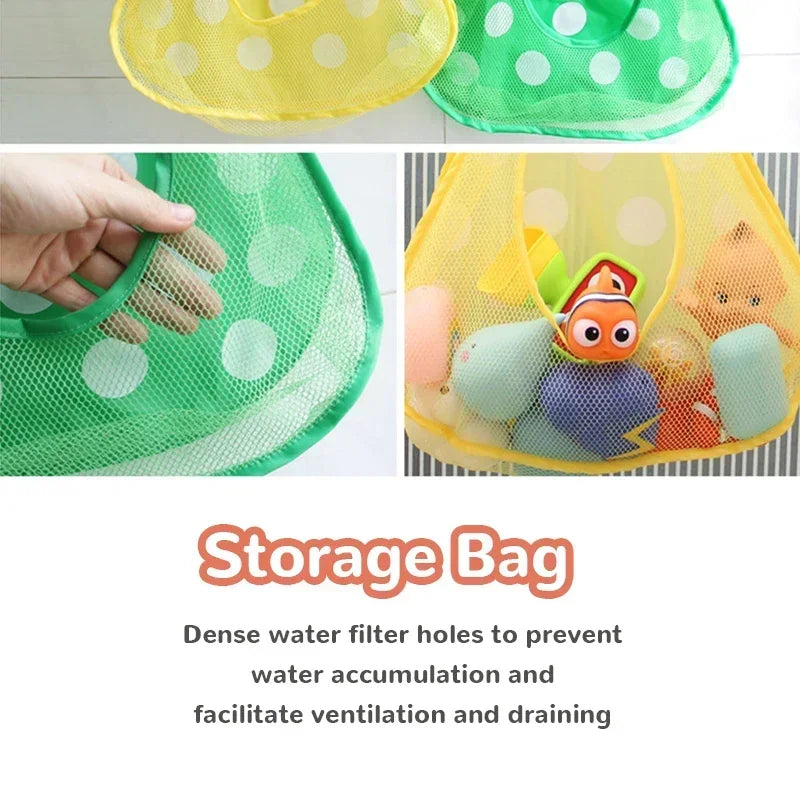 A yellow and green mesh storage bag for bath toys, showing a hand placing toys inside.