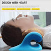 A person is using a blue neck stretcher device to perform point pressure massage and stretch the cervical spine.