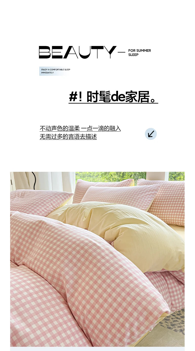 A close-up of a pink and white checkered duvet cover set with a yellow pillow on a bed.