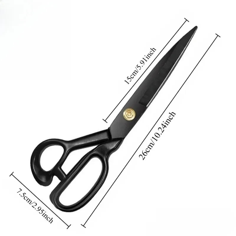 A pair of black heavy-duty tailor scissors with a carbon steel blade and ergonomic handle shown against a white background.