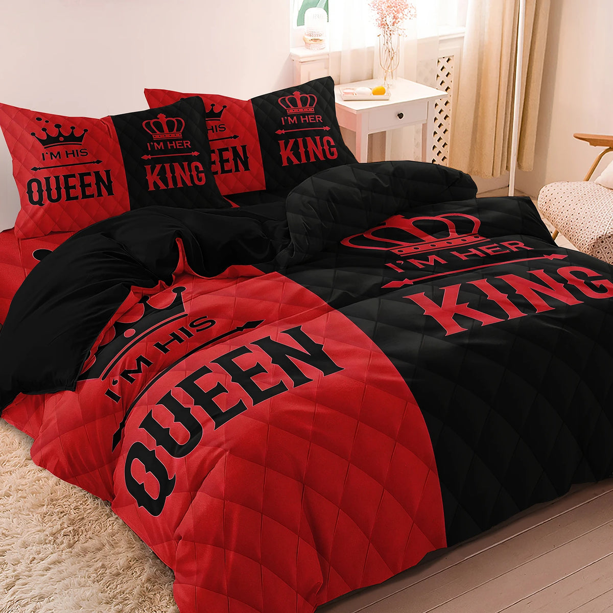 A couple duvet set featuring a pink and black crown print microfiber bedding on a bed.