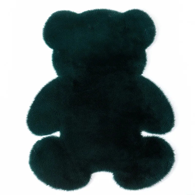 A dark green plush bear-shaped non-slip area rug.