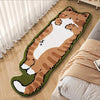 A decorative cat mat featuring an orange tabby cat design placed on a light wooden floor.
