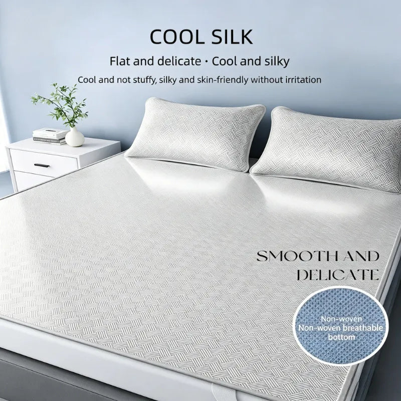 A set of three cool silk sheets displayed on a bed with pillows and a close-up view of the fabric texture.