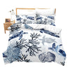A set of sea turtle patterned duvet covers and pillows with a white background.