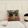 A decorative cushion cover featuring a cheetah print and green foliage in pink and purple tones.
