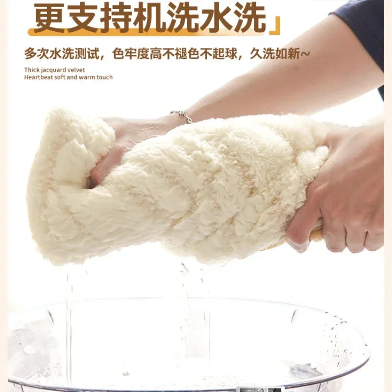 A hand is holding a fluffy white fabric product, likely a sofa armrest cover, above a glass bowl.